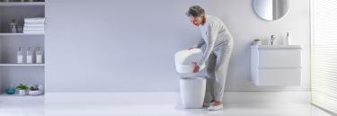 Toilettensitzerhöhung Aquatec 90 Ergo mit Deckel
