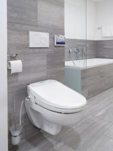 Toilettensitzerhöhungen und Bidet